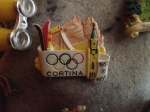 cortina antique souvenir olympic pin