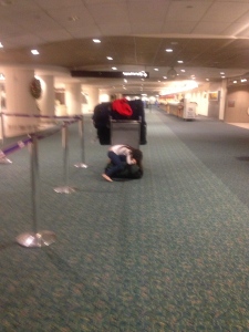 child asleep in airport