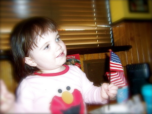 child holding us flag
