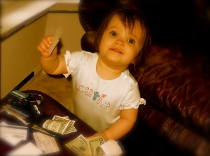 cutie pie holding american dollars money