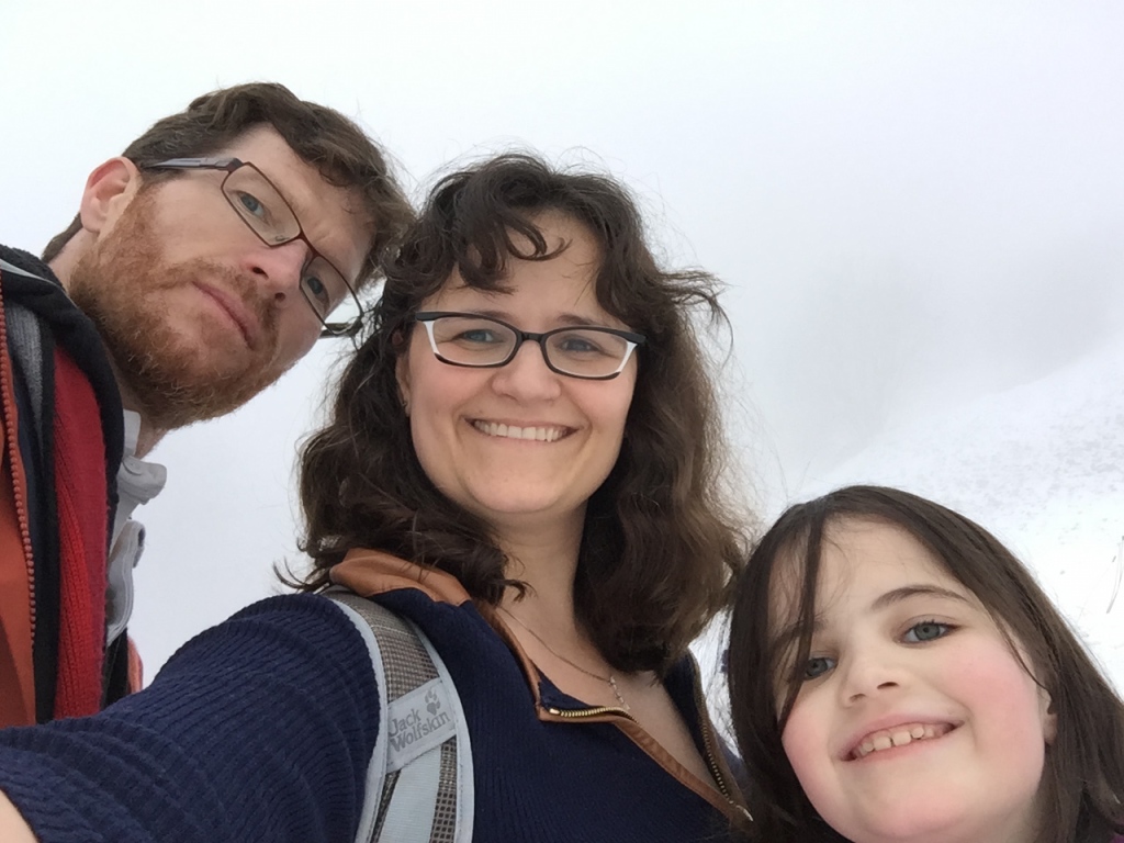 family hiking, fog, europe