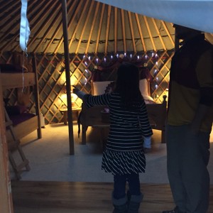 The kid realizes there's a bunkbed for her. In a tent.